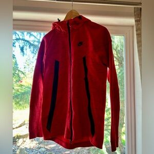 NIKE TECH jacket. Mens small. Full zipper pockets. Nylon hood.